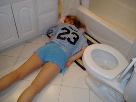 Girl passed out on bathroom floor